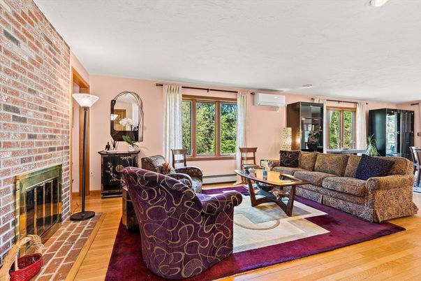 Fireplace, Interior, Living room, Recessed Lighting, Stone Walls, Wood Texture Flooring