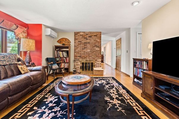 Fireplace, Interior, Living room, Recessed Lighting, Stone Walls, Wood Texture Flooring