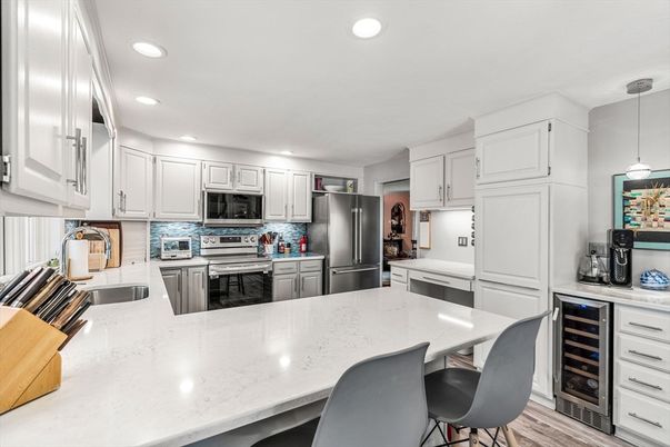 Interior, Kitchen, Pendant Lights, Recessed Lighting, Stainless Steel Appliances, Wood Texture Flooring