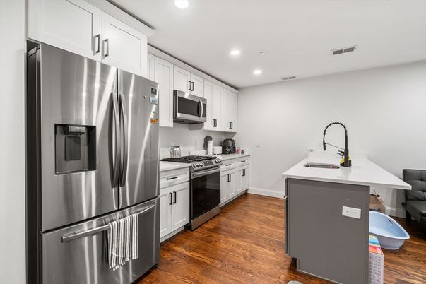 Interior, Kitchen, Recessed Lighting, Stainless Steel Appliances, Wood Texture Flooring