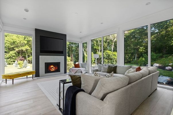 Fireplace, Interior, Living room, Recessed Lighting, Sun Room, Wood Texture Flooring