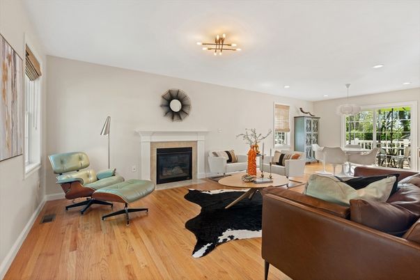 Dining room, Fireplace, Interior, Living room, Pendant Lights, Recessed Lighting, Wood Texture Flooring