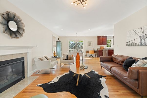 Chandelier, Dining room, Fireplace, Interior, Living room, Pendant Lights, Recessed Lighting, Wood Texture Flooring