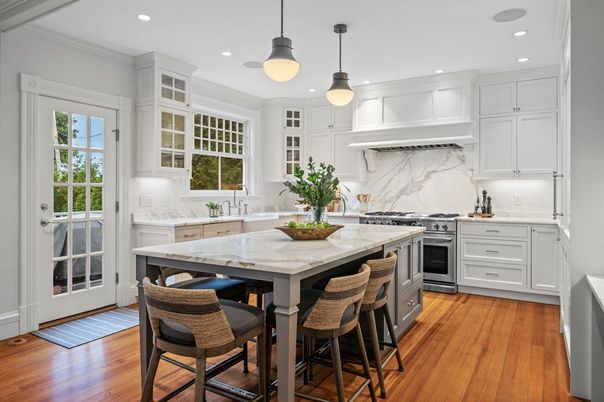 Interior, Kitchen, Marble Walls, Pendant Lights, Recessed Lighting, Stainless Steel Appliances, Wood Texture Flooring