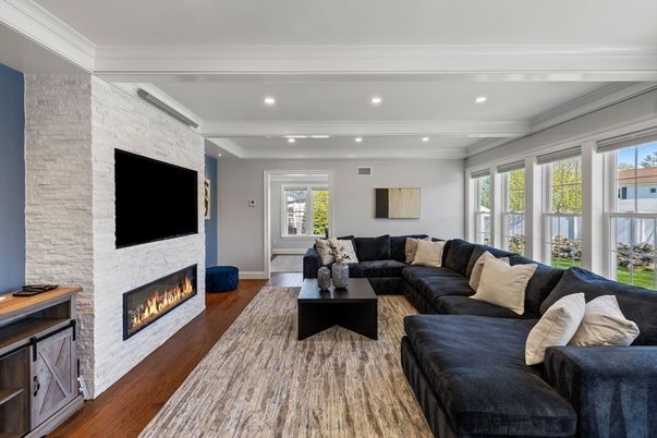 Fireplace, Interior, Living room, Recessed Lighting, Stone Walls, Wood Texture Flooring