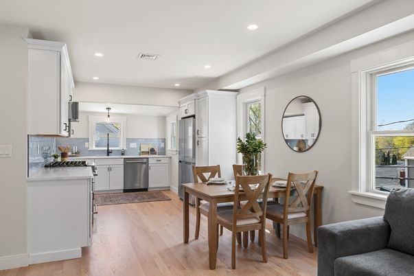 Dining room, Interior, Kitchen, Pendant Lights, Recessed Lighting, Stainless Steel Appliances, Wood Texture Flooring
