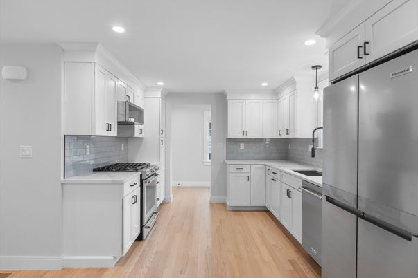 Interior, Kitchen, Pendant Lights, Recessed Lighting, Stainless Steel Appliances, Wood Texture Flooring