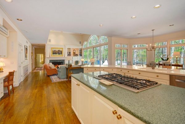 Chandelier, Dining room, Fireplace, Interior, Kitchen, Living room, Pendant Lights, Recessed Lighting, Wood Texture Flooring