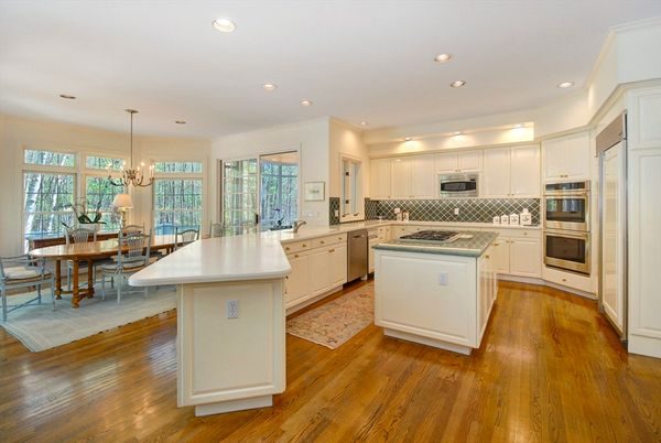 Chandelier, Dining room, Interior, Kitchen, Recessed Lighting, Stainless Steel Appliances, Wood Texture Flooring