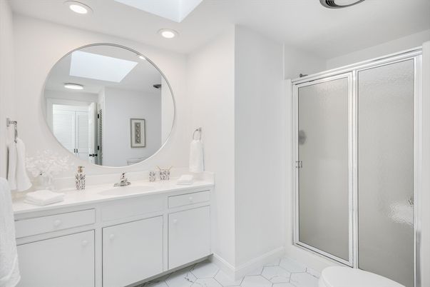 Bathroom, Dual Sink Vanities, Glass Shower, Interior, Marble, Recessed Lighting