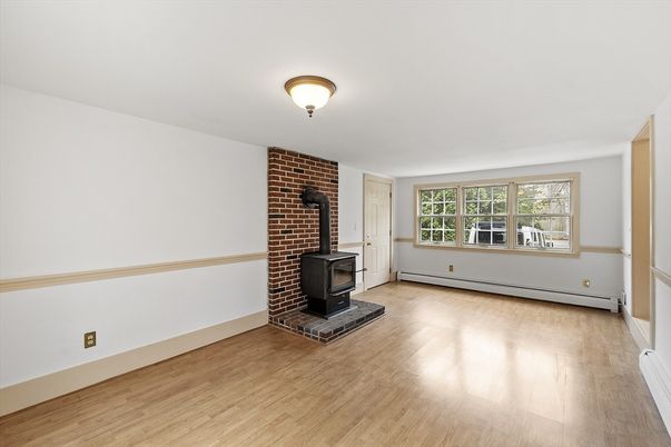 Empty room, Fireplace, Interior, Stone Walls, Wood Texture Flooring