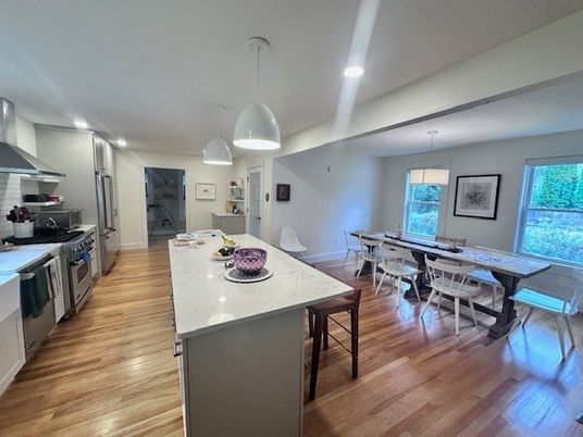 Dining room, Interior, Kitchen, Pendant Lights, Recessed Lighting, Stainless Steel Appliances, Wood Texture Flooring