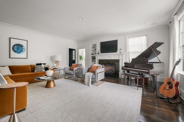 Fireplace, Interior, Living room, Piano, Recessed Lighting, Wood Texture Flooring