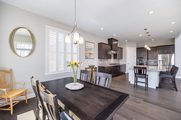 Dining room, Interior, Kitchen, Pendant Lights, Recessed Lighting, Stainless Steel Appliances, Wood Texture Flooring