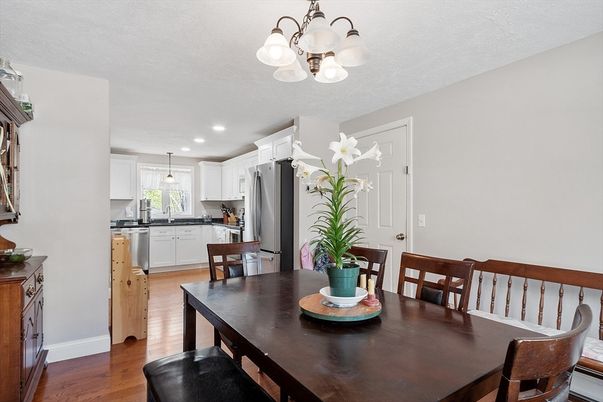 Dining room, Interior, Kitchen, Pendant Lights, Recessed Lighting, Stainless Steel Appliances, Wood Texture Flooring