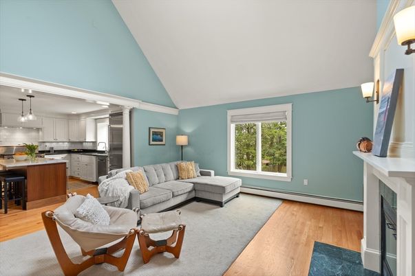 Fireplace, Interior, Kitchen, Living room, Pendant Lights, Stainless Steel Appliances, Wood Texture Flooring