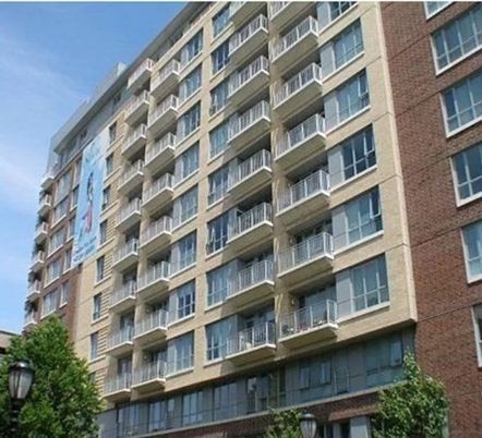 Exterior, Facade, Brick Facade, Condo Building