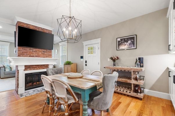 Dining room, Fireplace, Interior, Pendant Lights, Stone Walls, Wood Texture Flooring