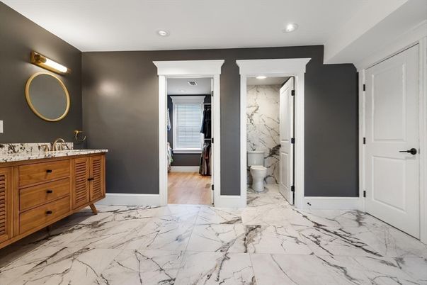 Bathroom, Dual Sink Vanities, Interior, Marble, Marble Walls, Recessed Lighting