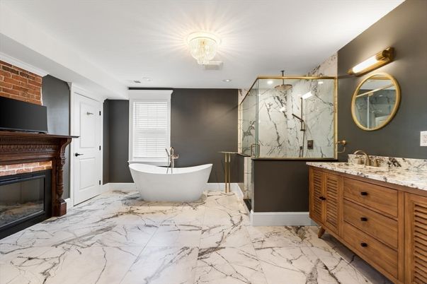 Bathroom, Dual Sink Vanities, Fireplace, Free Standing Baths, Glass Shower, Interior, Marble, Marble Walls, Recessed Lighting