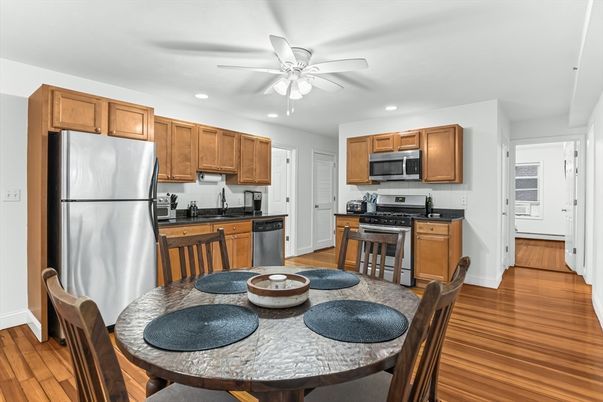 Dining room, Interior, Kitchen, Recessed Lighting, Stainless Steel Appliances, Wood Texture Flooring