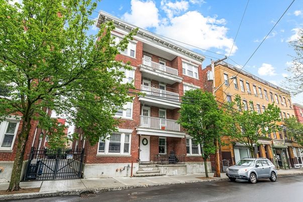 Exterior, Facade, Brick Facade, Condo Building