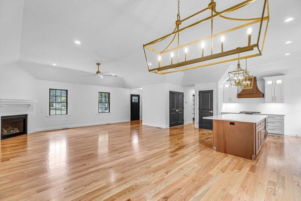 Empty room, Fireplace, Interior, Kitchen, Pendant Lights, Recessed Lighting, Wood Texture Flooring