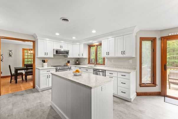Dining room, Interior, Kitchen, Recessed Lighting, Stainless Steel Appliances, Wood Texture Flooring