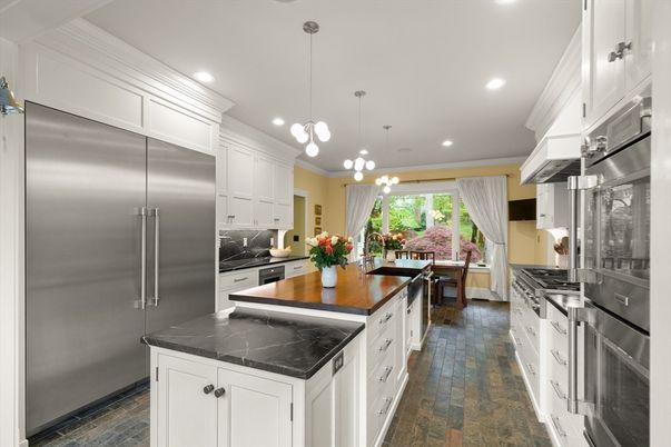 Dining room, Interior, Kitchen, Pendant Lights, Recessed Lighting, Stainless Steel Appliances, Wood Texture Flooring