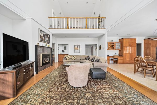 Dining room, Fireplace, Interior, Living room, Recessed Lighting, Wood Texture Flooring