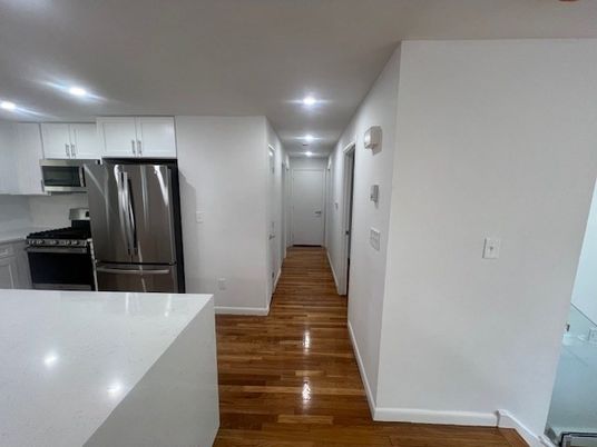 Interior, Kitchen, Recessed Lighting, Stainless Steel Appliances, Wood Texture Flooring