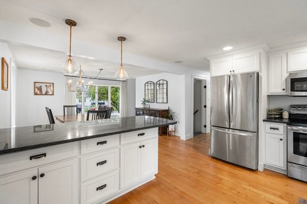 Dining room, Interior, Kitchen, Pendant Lights, Recessed Lighting, Stainless Steel Appliances, Wood Texture Flooring