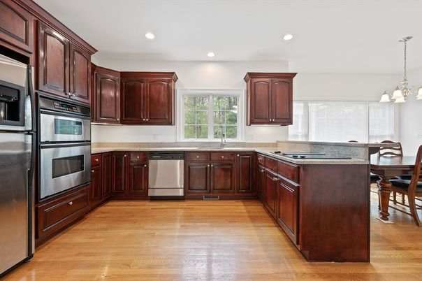 Chandelier, Dining room, Interior, Kitchen, Pendant Lights, Recessed Lighting, Stainless Steel Appliances, Wood Texture Flooring