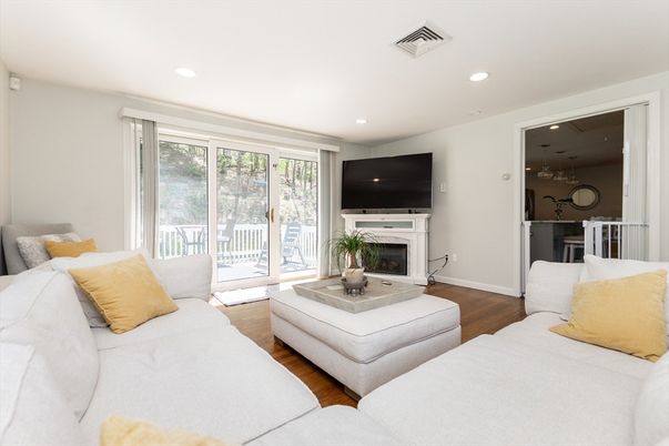 Fireplace, Interior, Living room, Recessed Lighting, Wood Texture Flooring