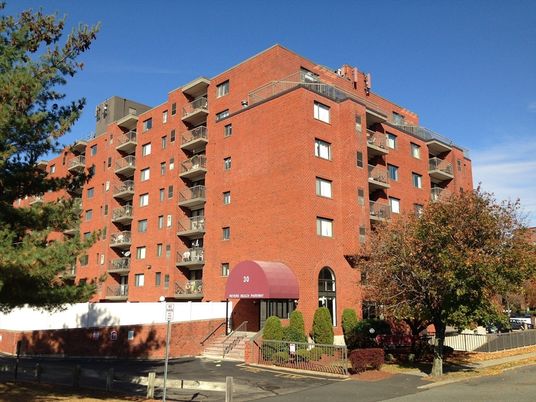 Exterior, Facade, Brick Facade, Condo Building