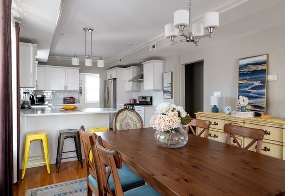 Chandelier, Dining room, Interior, Kitchen, Pendant Lights, Stainless Steel Appliances, Wood Texture Flooring