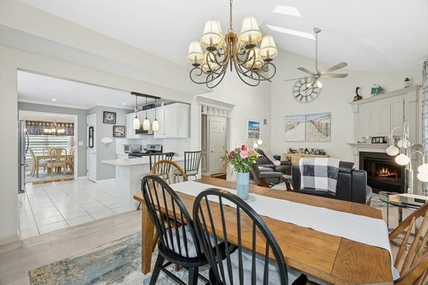 Chandelier, Dining room, Fireplace, Interior, Kitchen, Living room, Pendant Lights, Recessed Lighting, Wood Texture Flooring