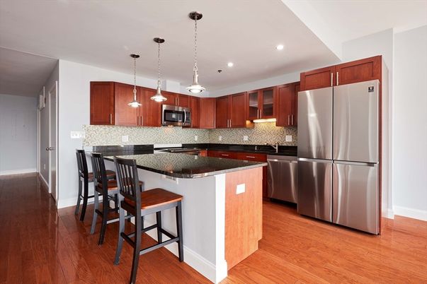 Interior, Kitchen, Pendant Lights, Recessed Lighting, Stainless Steel Appliances, Wood Texture Flooring