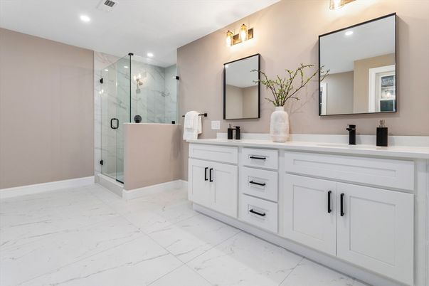 Bathroom, Dual Sink Vanities, Glass Shower, Interior, Marble, Marble Walls, Recessed Lighting