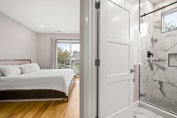 Bathroom, Bedroom, Glass Shower, Interior, Marble Walls, Recessed Lighting, Wood Texture Flooring