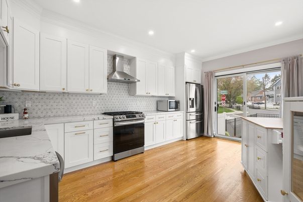 Interior, Kitchen, Recessed Lighting, Stainless Steel Appliances, Wood Texture Flooring