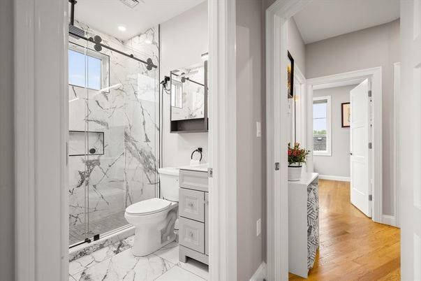 Bathroom, Glass Shower, Interior, Marble, Marble Walls, Recessed Lighting, Wood Texture Flooring