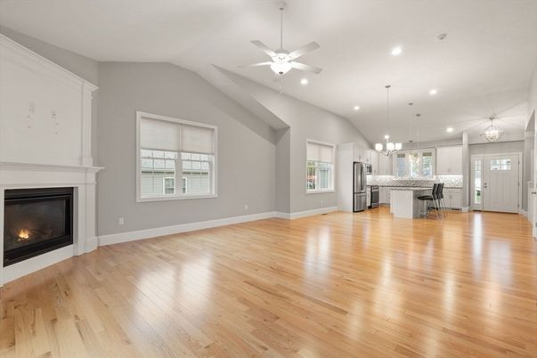 Empty room, Fireplace, Interior, Kitchen, Pendant Lights, Recessed Lighting, Wood Texture Flooring