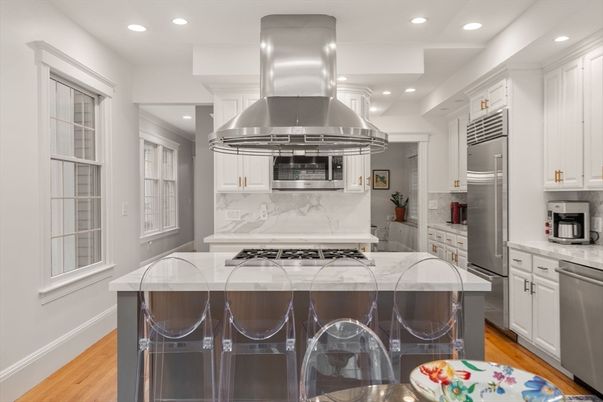 Interior, Kitchen, Marble Walls, Recessed Lighting, Stainless Steel Appliances, Wood Texture Flooring