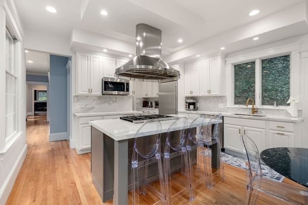 Interior, Kitchen, Marble Walls, Recessed Lighting, Stainless Steel Appliances, Wood Texture Flooring
