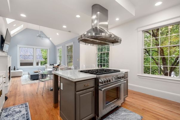 Dining room, Interior, Kitchen, Living room, Recessed Lighting, Stainless Steel Appliances, Wood Texture Flooring