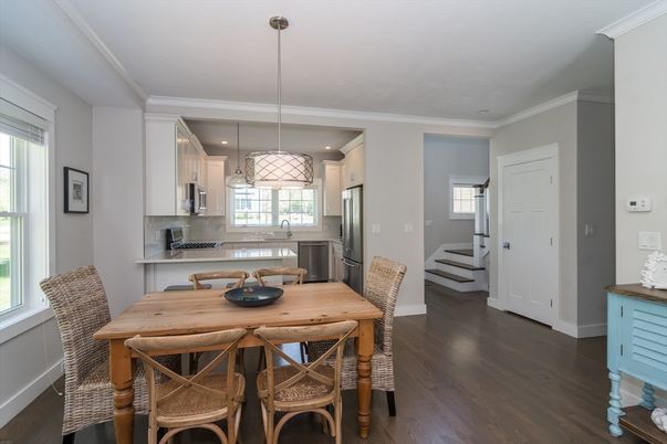 Dining room, Interior, Kitchen, Pendant Lights, Recessed Lighting, Stainless Steel Appliances, Wood Texture Flooring