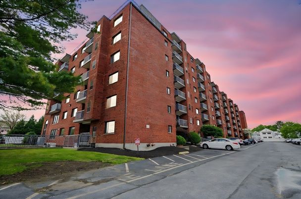 Exterior, Facade, Brick Facade, Condo Building