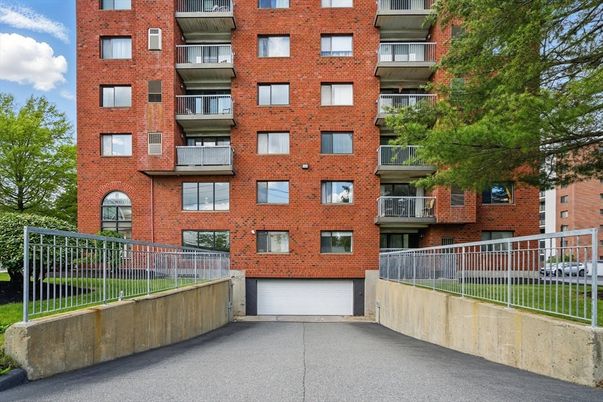 Attached, Exterior, Facade, Brick Facade, Condo Building