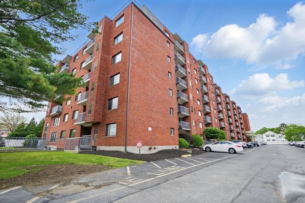 Exterior, Facade, Brick Facade, Condo Building
